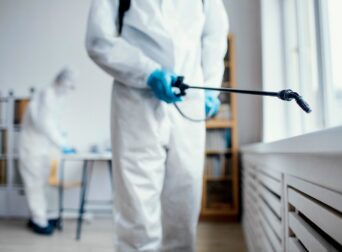 imgi_18_people-disinfecting-biohazard-area